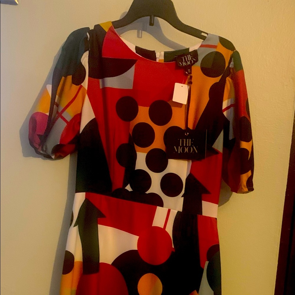 Multicolor open front dress.